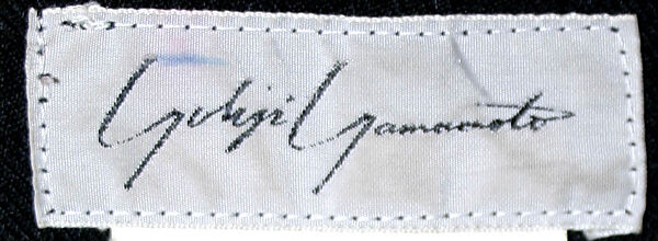 Coat, Yohji Yamamoto (Japanese, born Tokyo, 1943), wool, plastic, Japanese