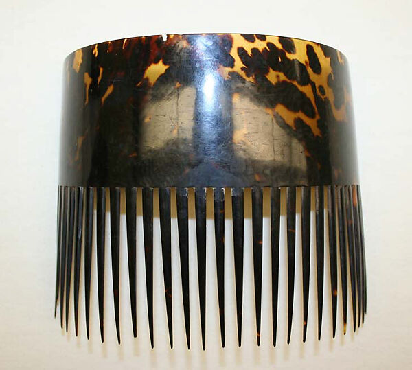 Comb, plastic (cellulose nitrate), American 