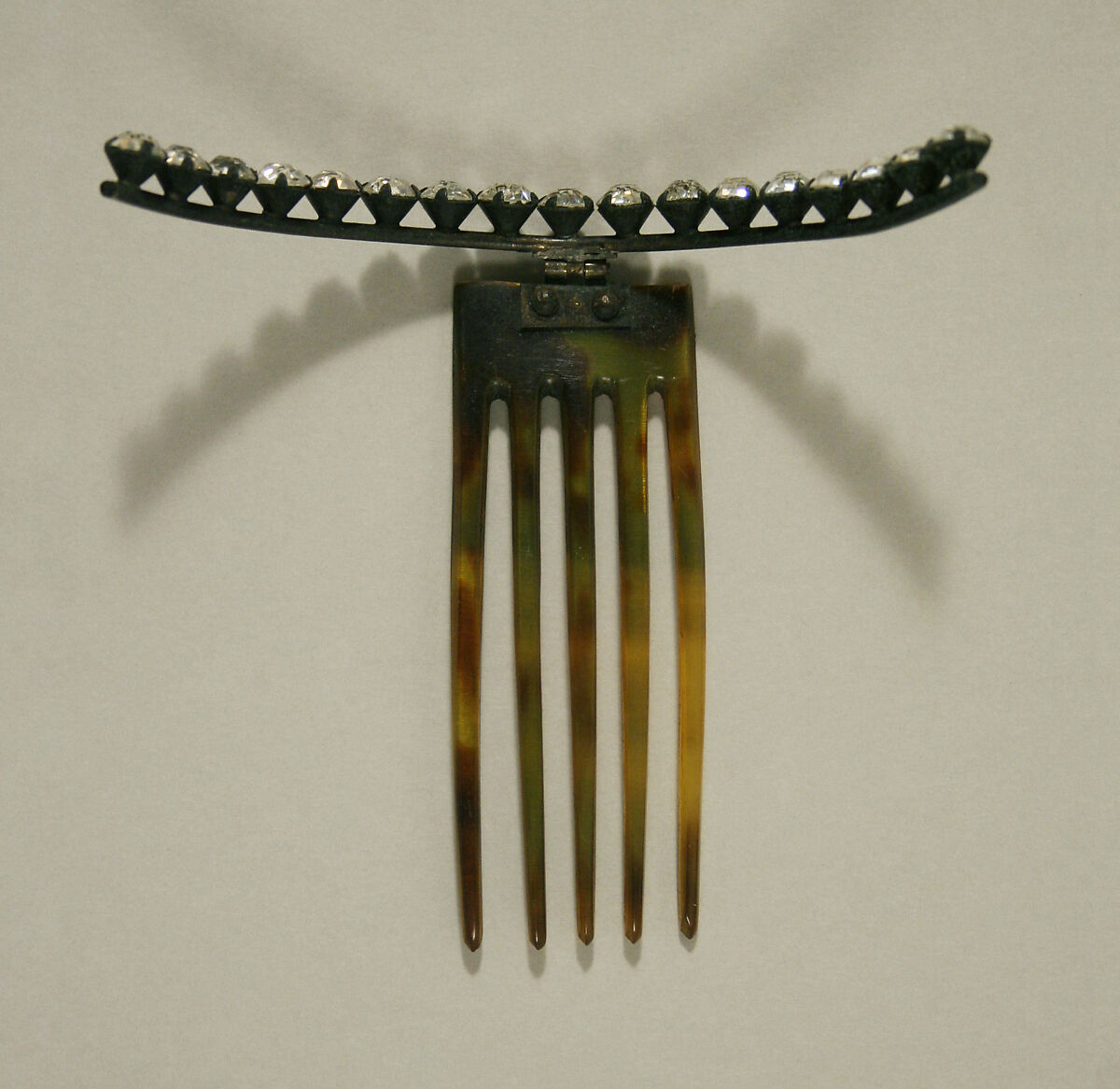 Comb, plastic (cellulose nitrate), metal, American