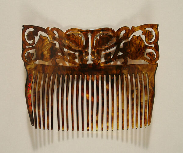 Comb, plastic (cellulose nitrate), American or European