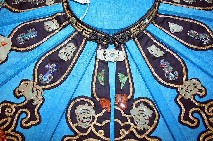 Collar, (a) Silk, metal, stone, enamel, feathers
(b) Paper, silk, China