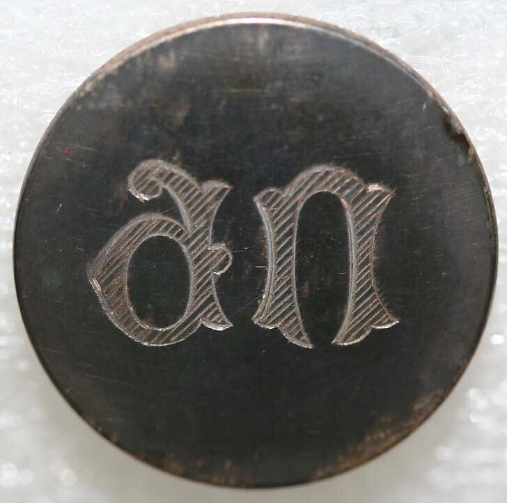 Button, metal, British