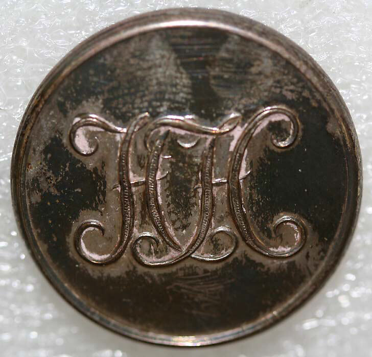 Button, metal, British