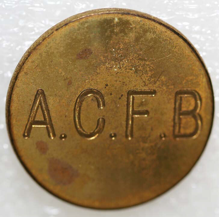 Button, metal, British