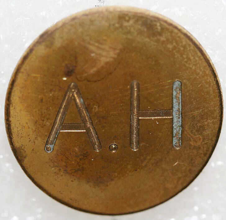 Button, metal, British