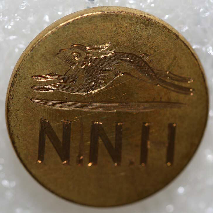 Button, metal, British