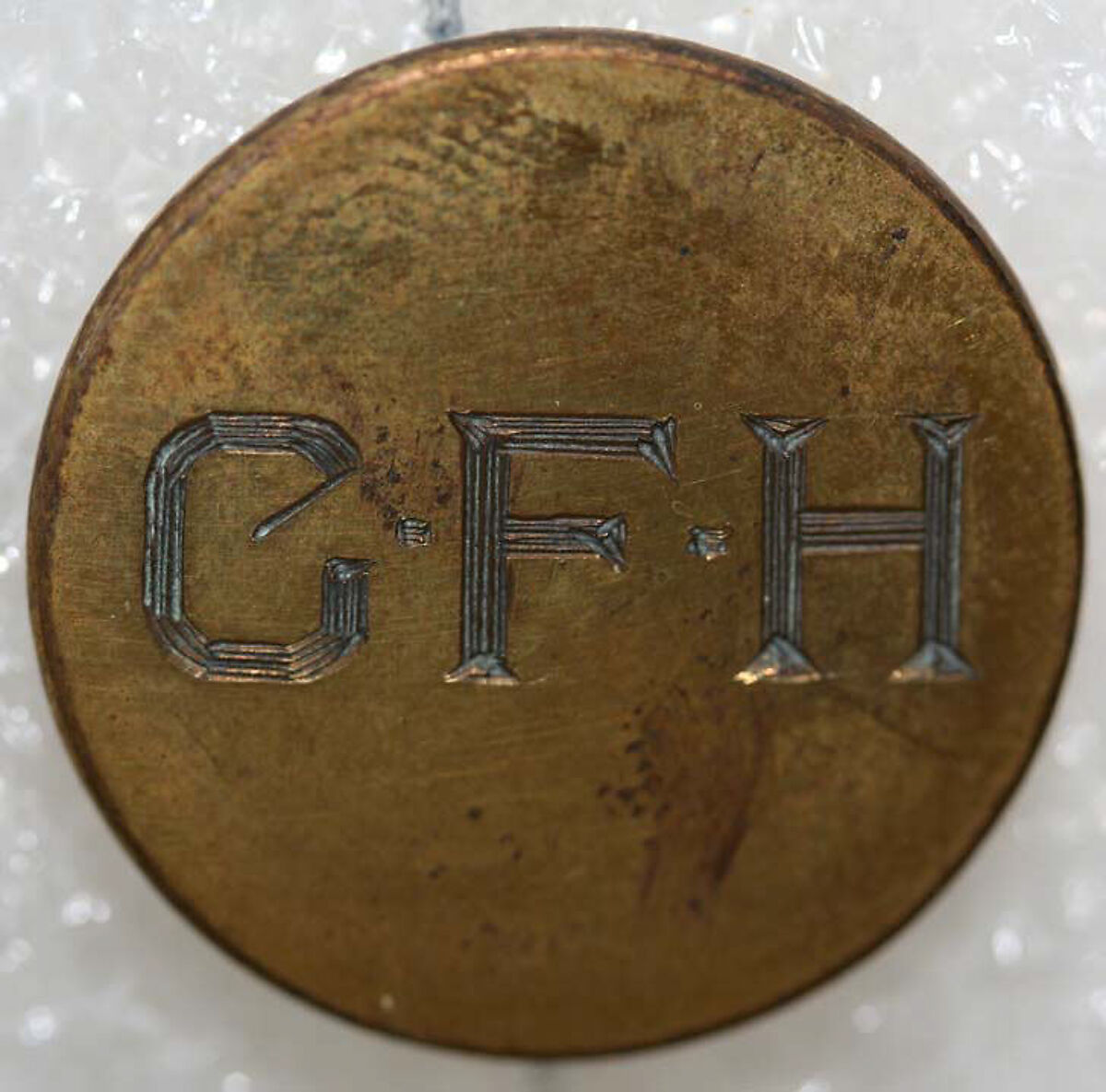 Button, metal, British