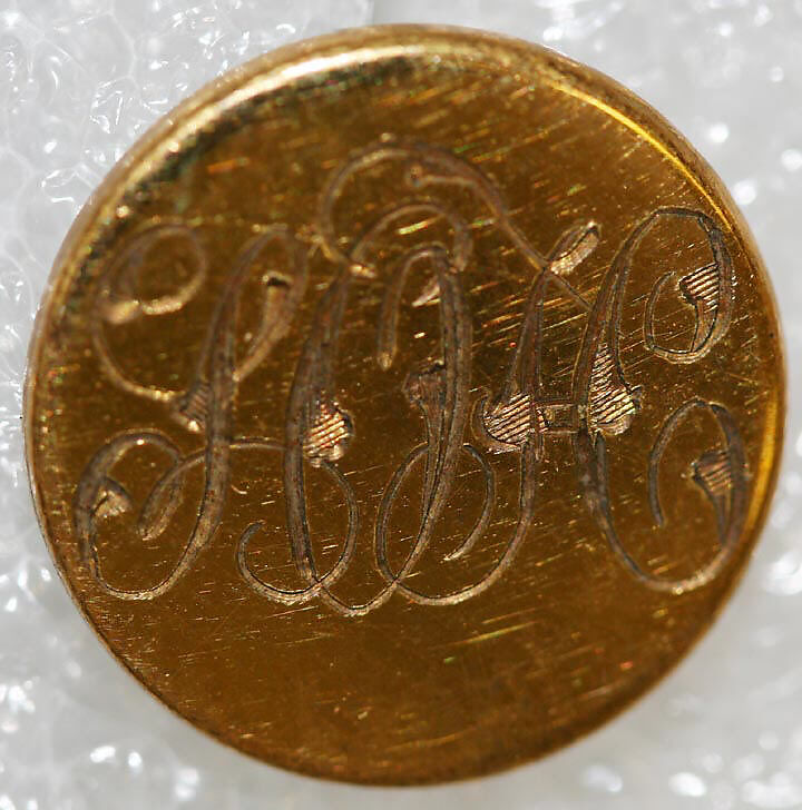 Button, metal, British