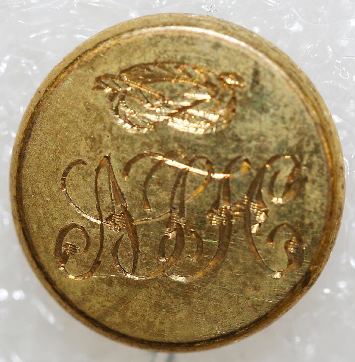 Button, metal, British