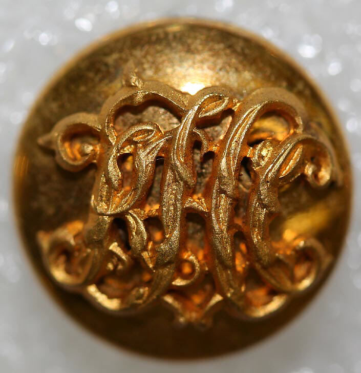 Button, metal, British