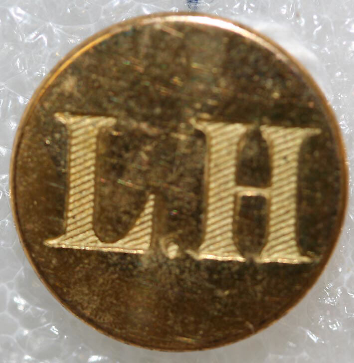 Button, metal, British