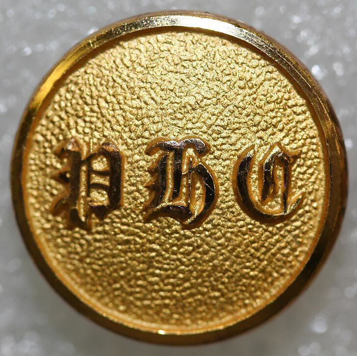 Button, metal, British