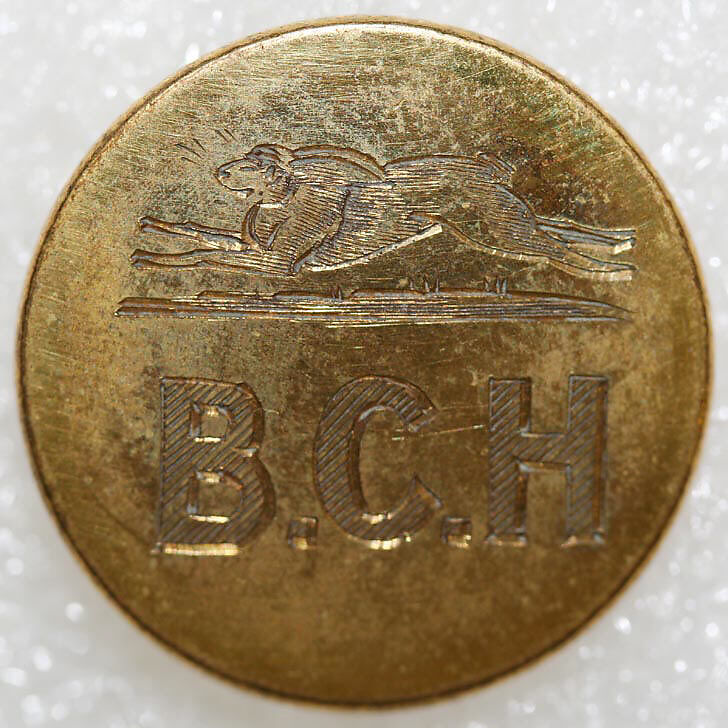 Button, metal, British