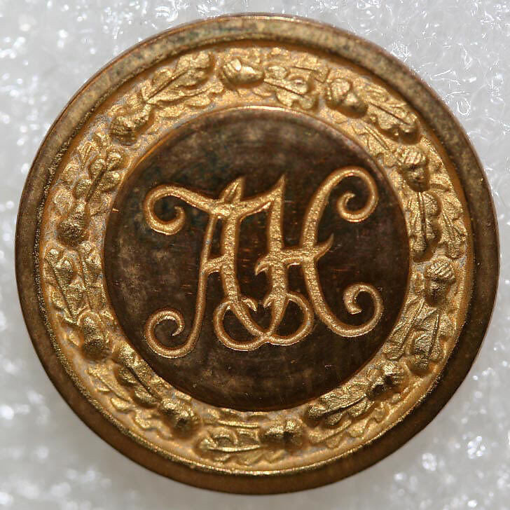 Button, metal, British