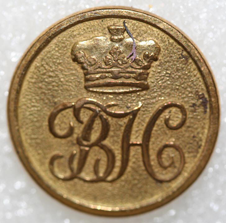 Button, metal, British