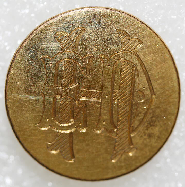 Button, metal, British