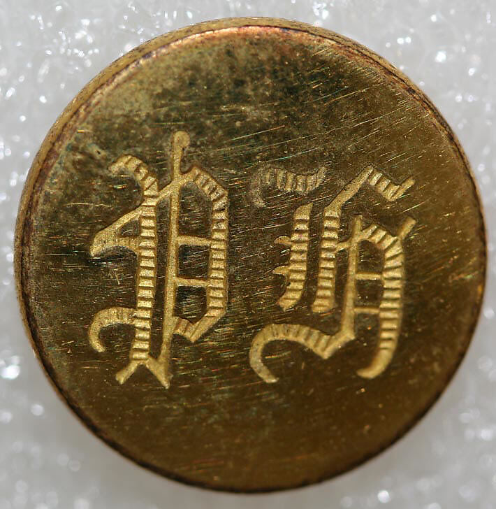 Button, metal, British