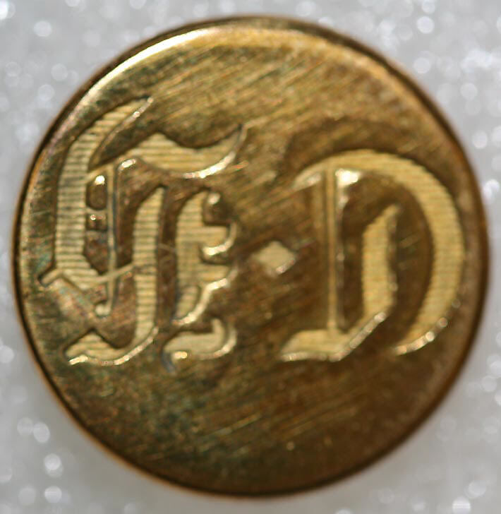 Button, metal, British