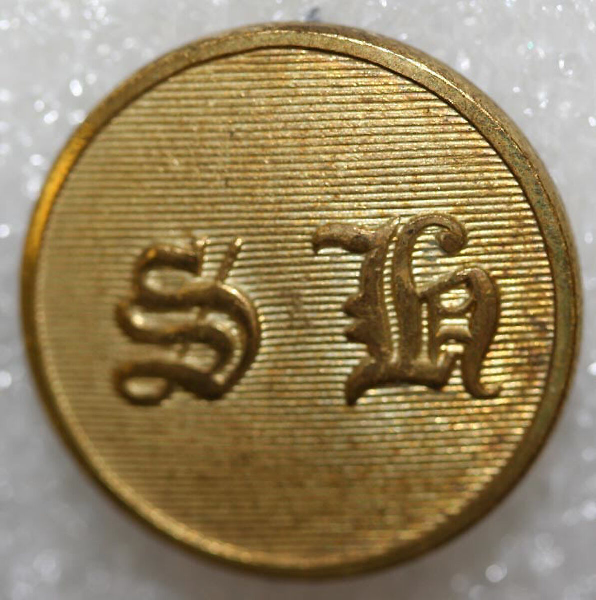 Button, metal, British