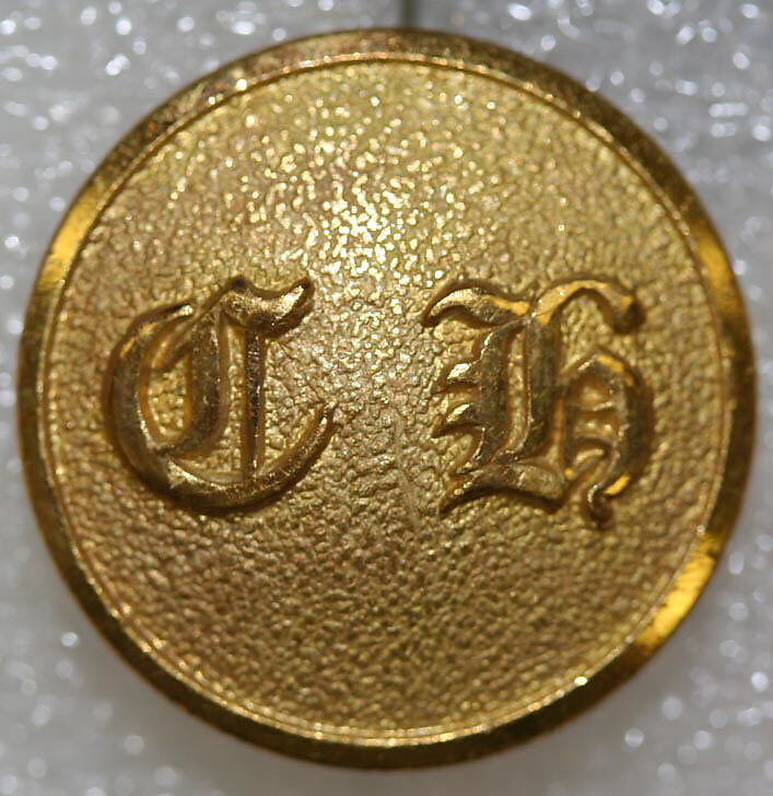 Button, metal, British