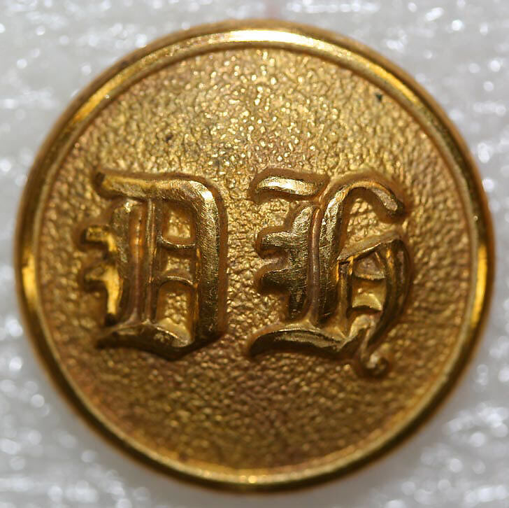 Button, metal, British