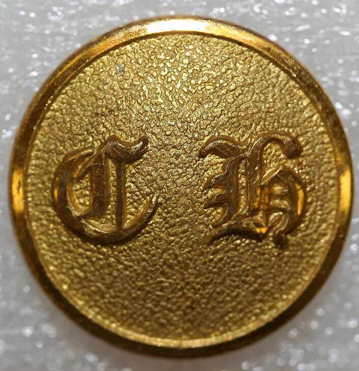 Button, metal, British