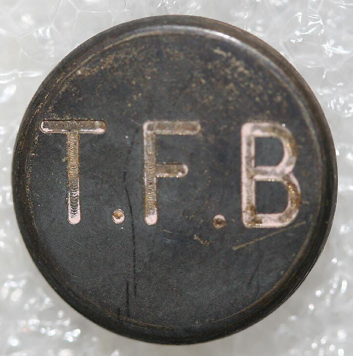 Button, metal, British
