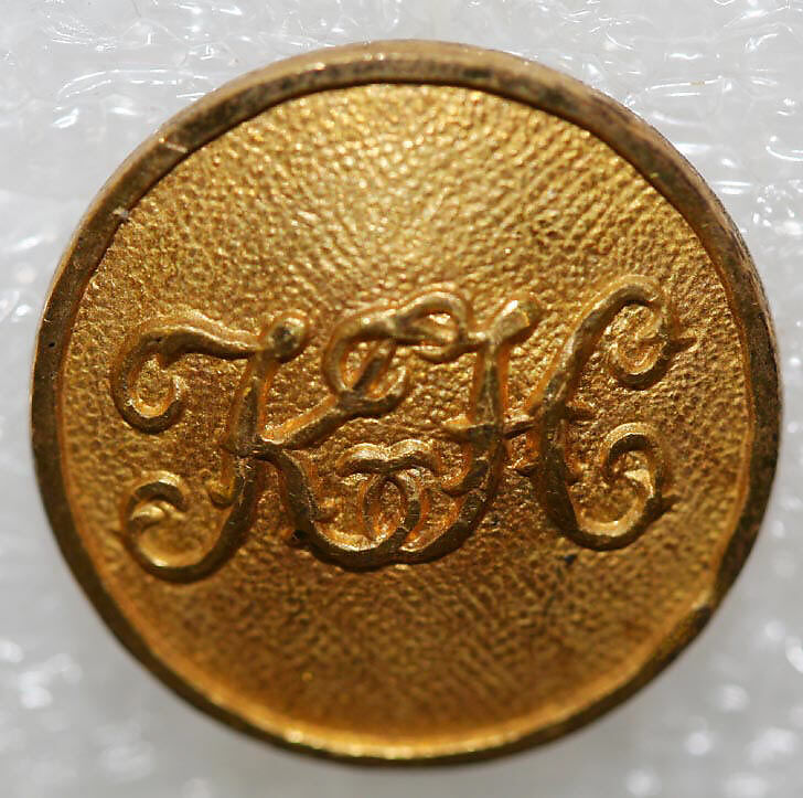 Button, metal, British