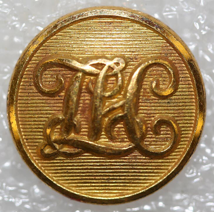 Button, metal, British