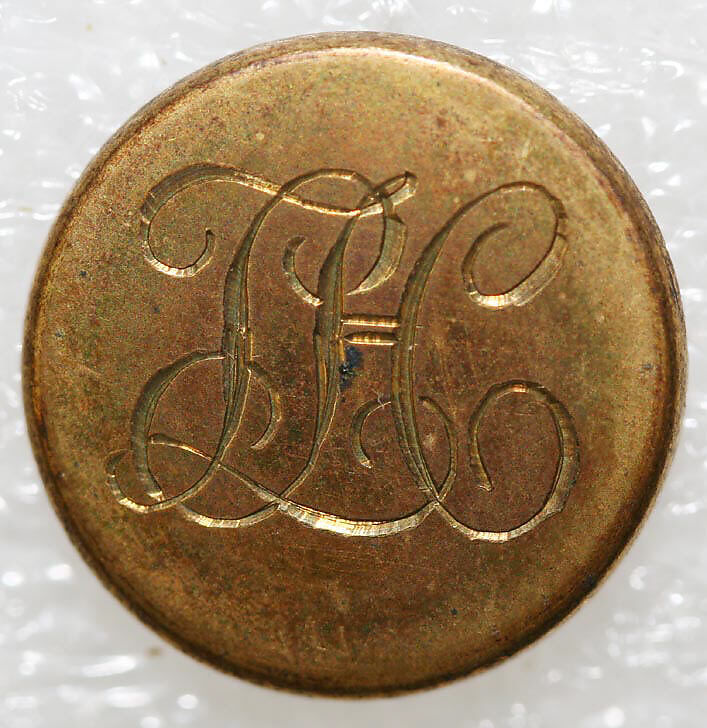 Button, metal, British