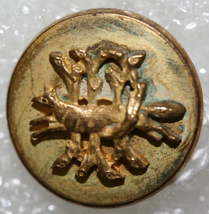 Button, metal, British