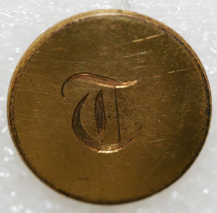 Button, metal, British