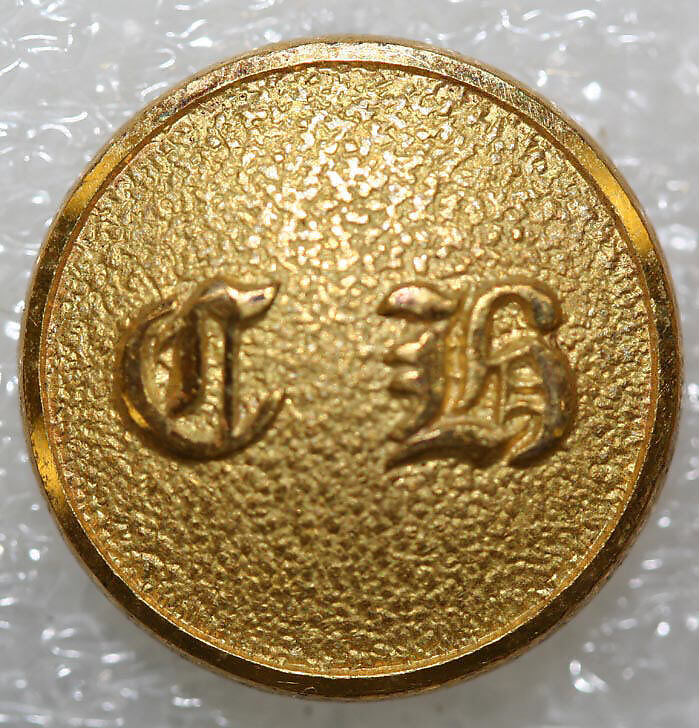 Button, metal, British