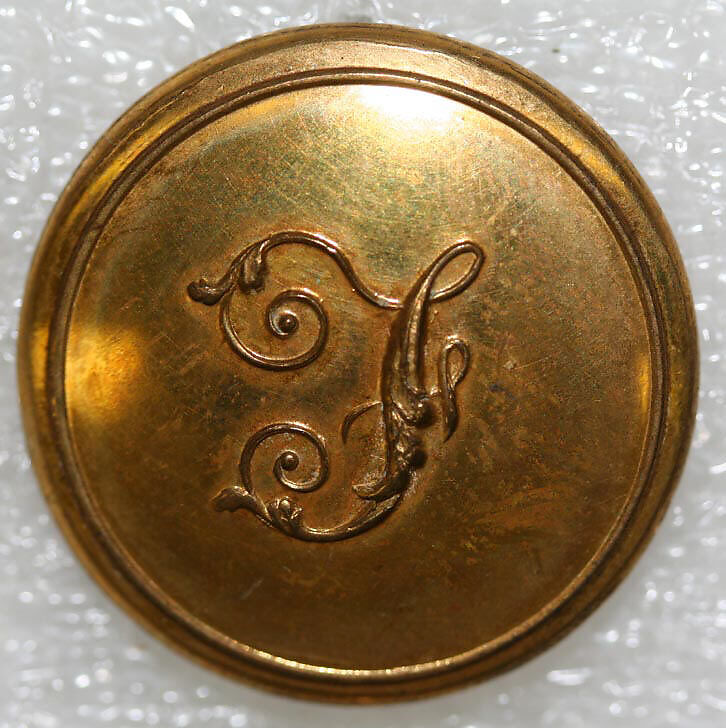 Button, metal, British