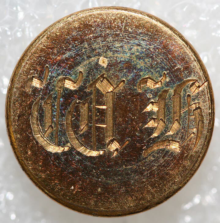 Button, metal, British