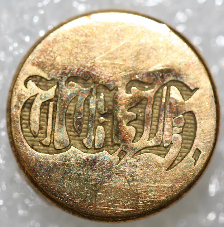 Button, metal, British