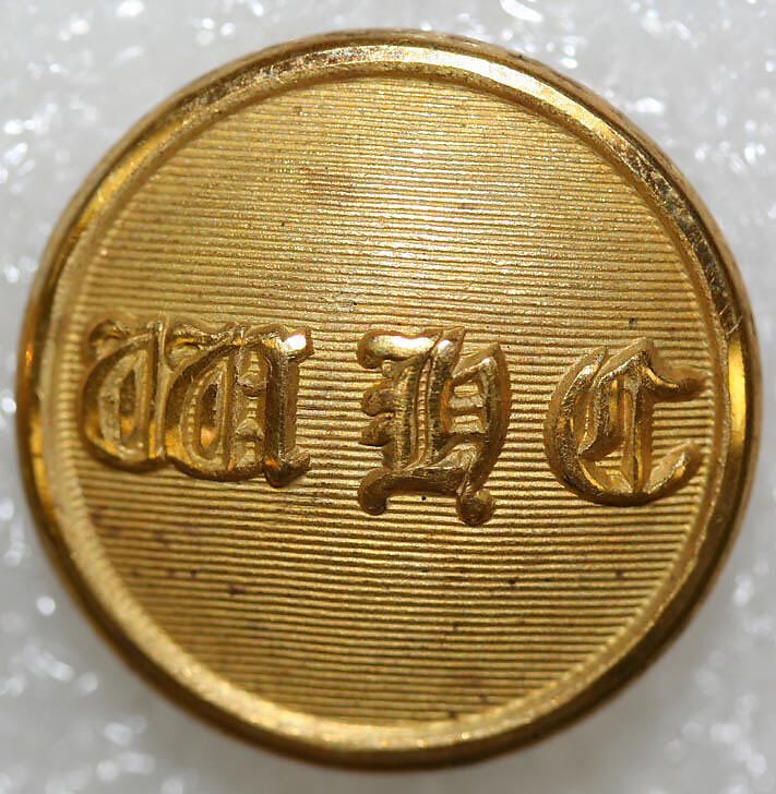 Button, metal, British
