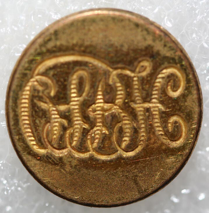 Button, metal, British