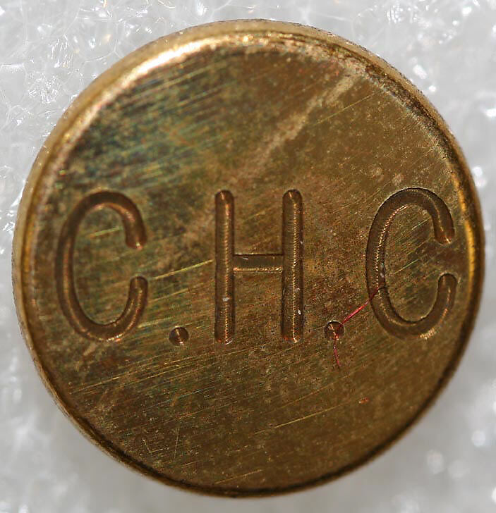 Button, metal, British