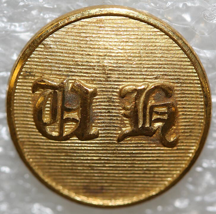 Button, metal, British