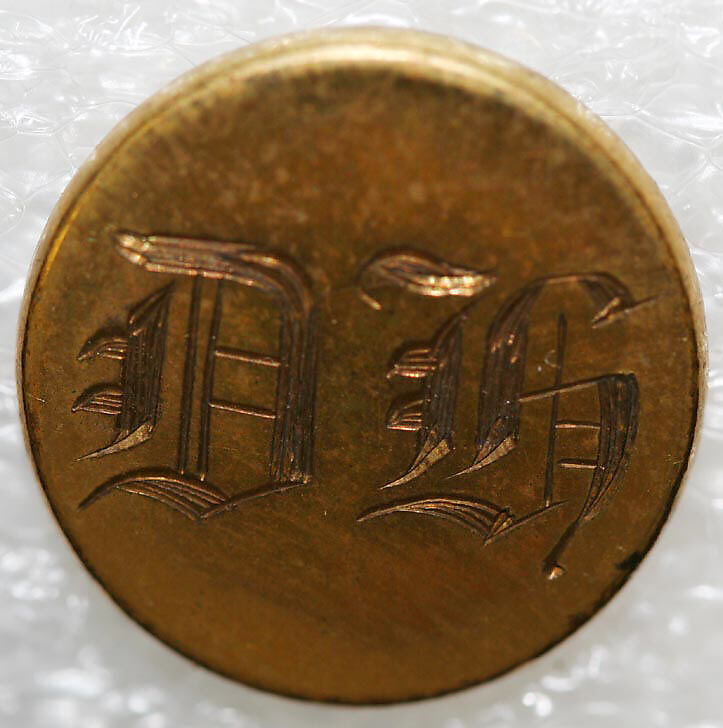 Button, metal, British