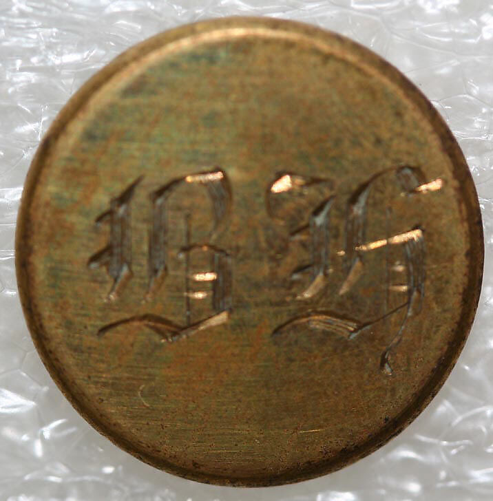 Button, metal, British