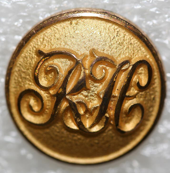 Button, metal, British