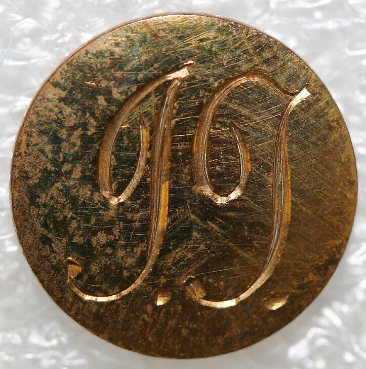 Button, metal, British