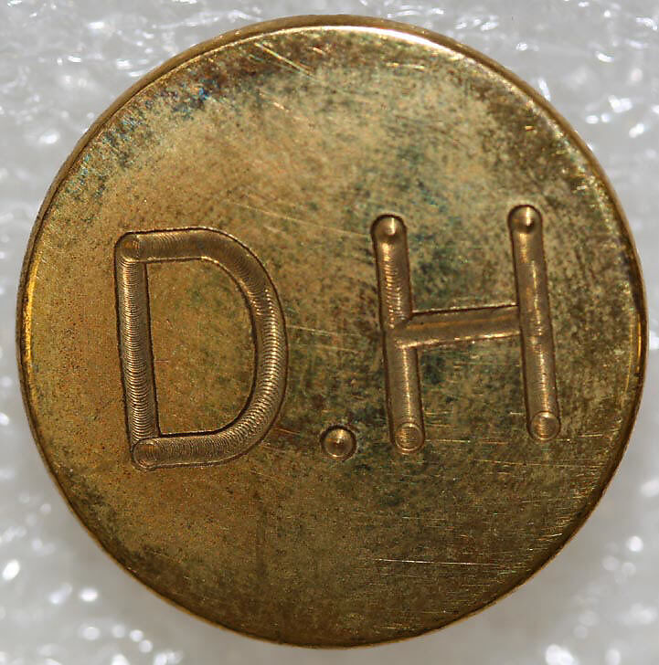 Button, metal, British