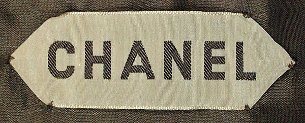 Suit, House of Chanel (French, founded 1910), a) wool/mohair/synthetic, silk, plastic, metal; b,c) wool/mohair/synthetic, silk, French