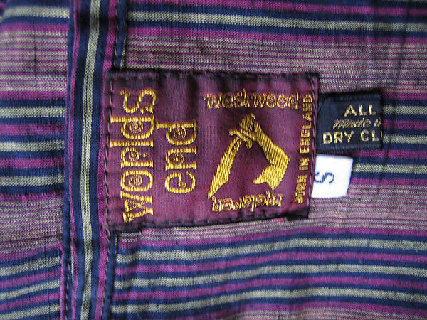 Suit, Vivienne Westwood (British, 1941–2022), a) wool, cotton, ceramic, plastic; b) wool, plastic, metal; c) linen, British