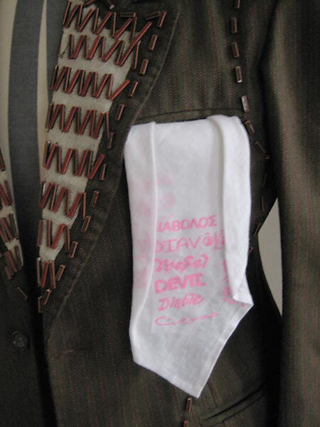 Suit, Vivienne Westwood (British, 1941–2022), a) wool, cotton, ceramic, plastic; b) wool, plastic, metal; c) linen, British