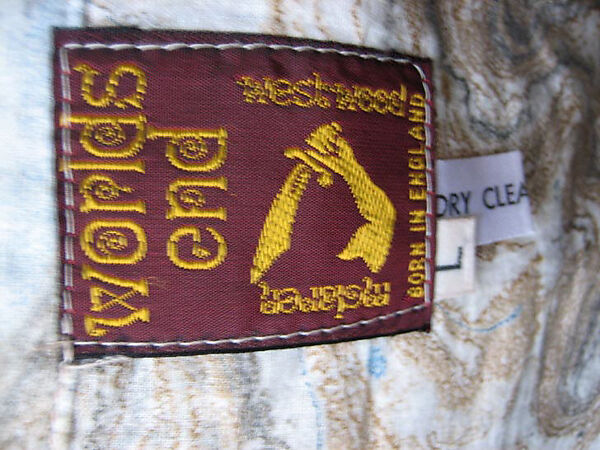 Suit, Vivienne Westwood (British, 1941–2022), a) wool, cotton, plastic; b) wool, metal, plastic, British