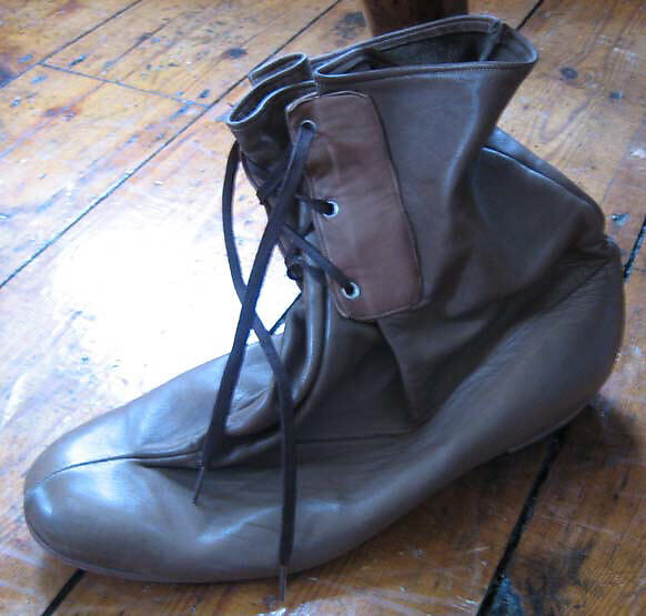 Buffalo, Vivienne Westwood (British, 1941–2022), a, b) leather, British 
